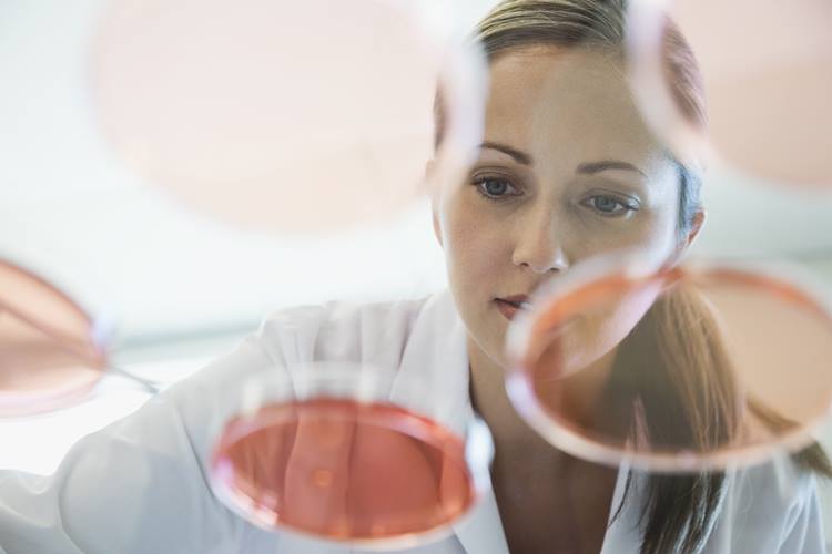 Femal scientist analyzing chemicals