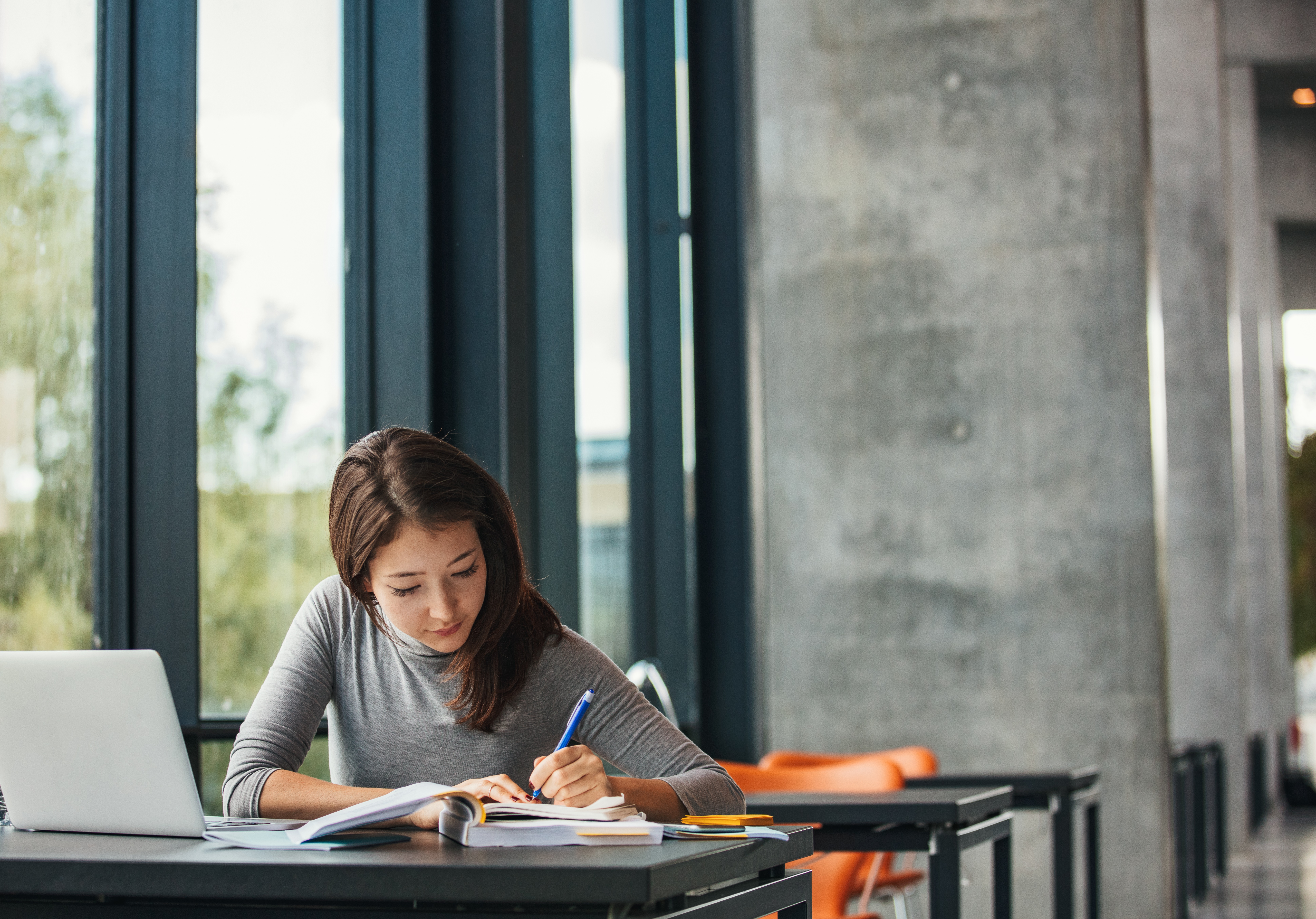 Student studying in a modern library