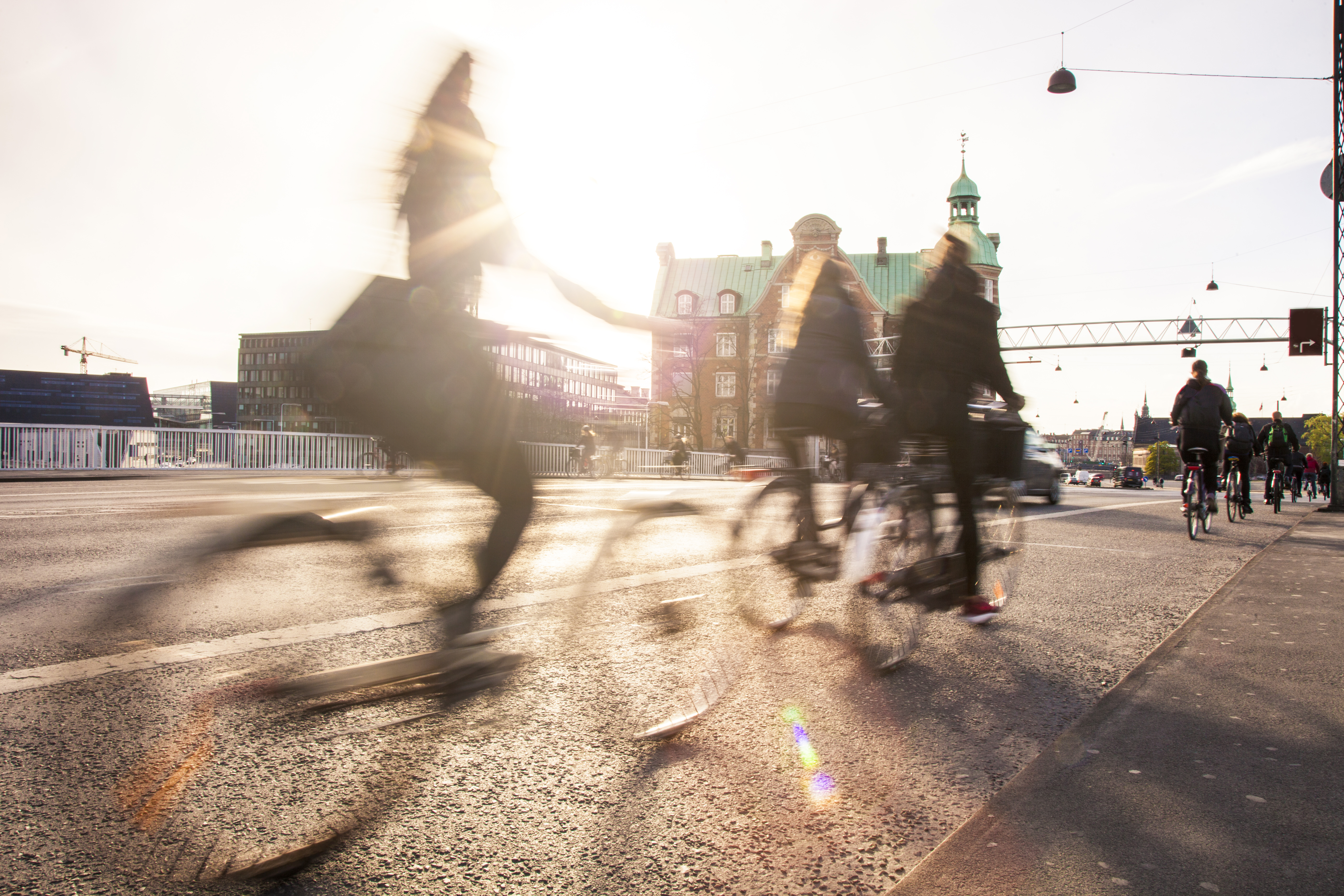 People biking in the sun