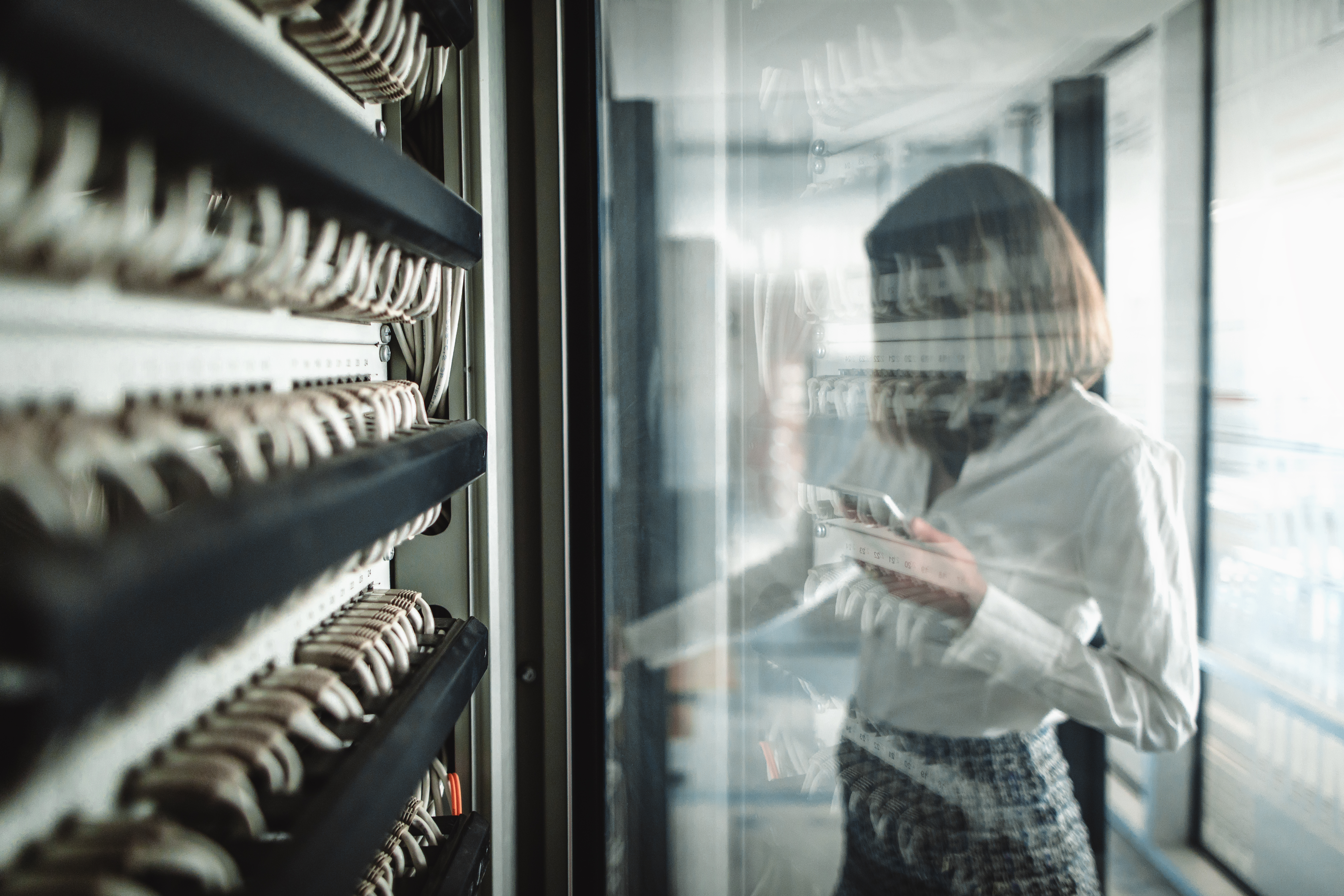 Businesswomen operating a server room