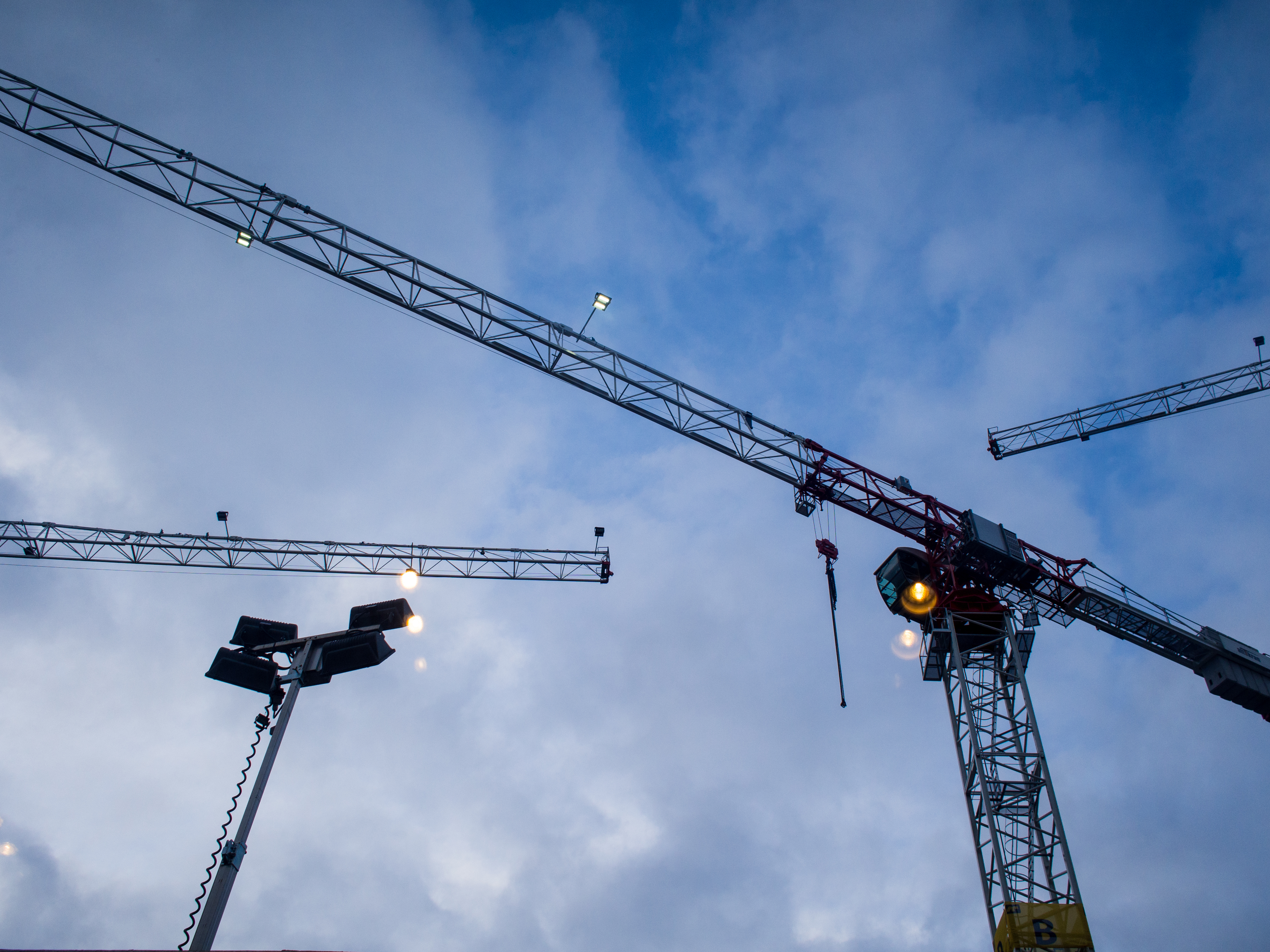 Cranes in the sky viewed from a long angle