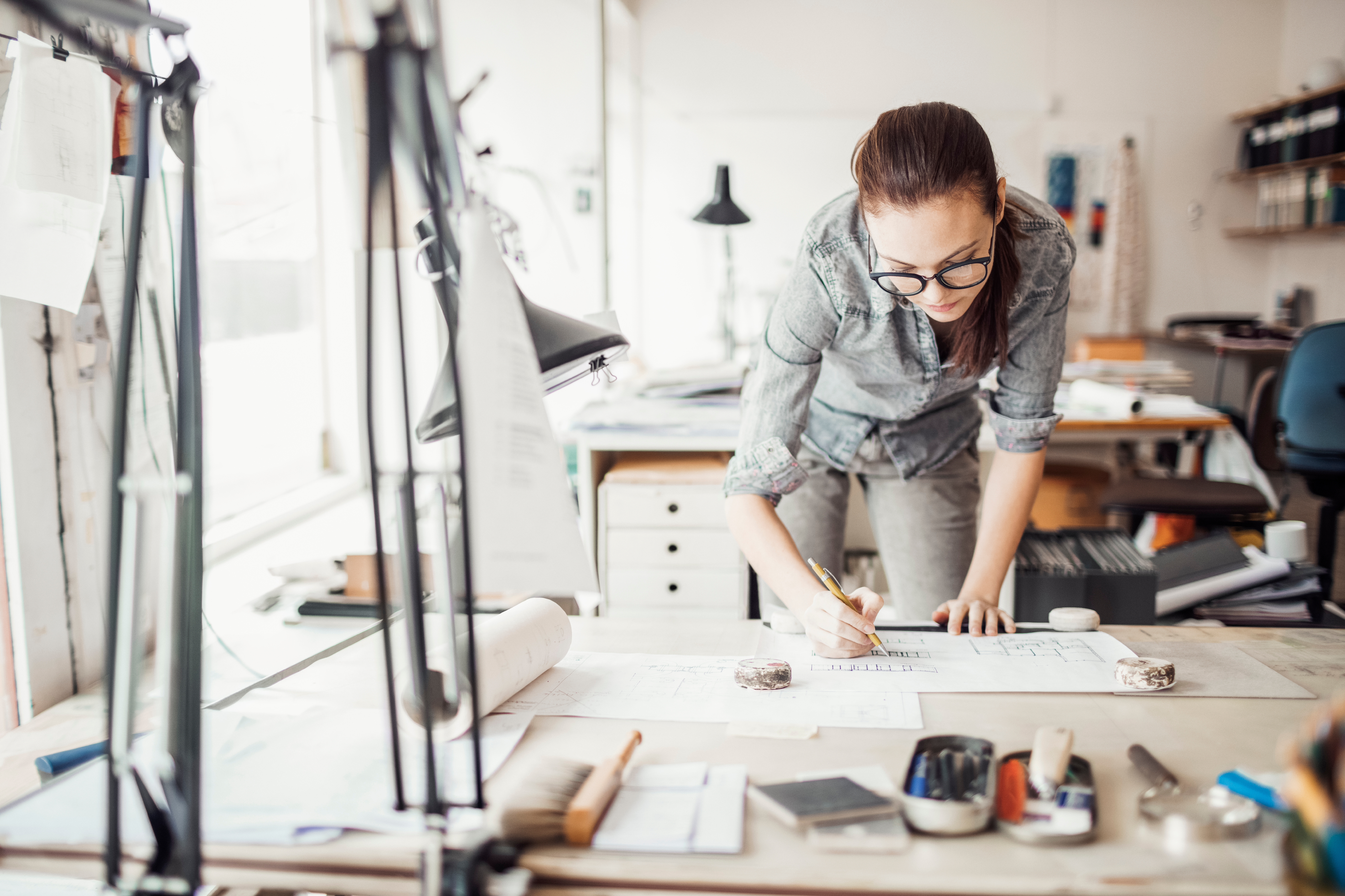 Young woman working on a creative project