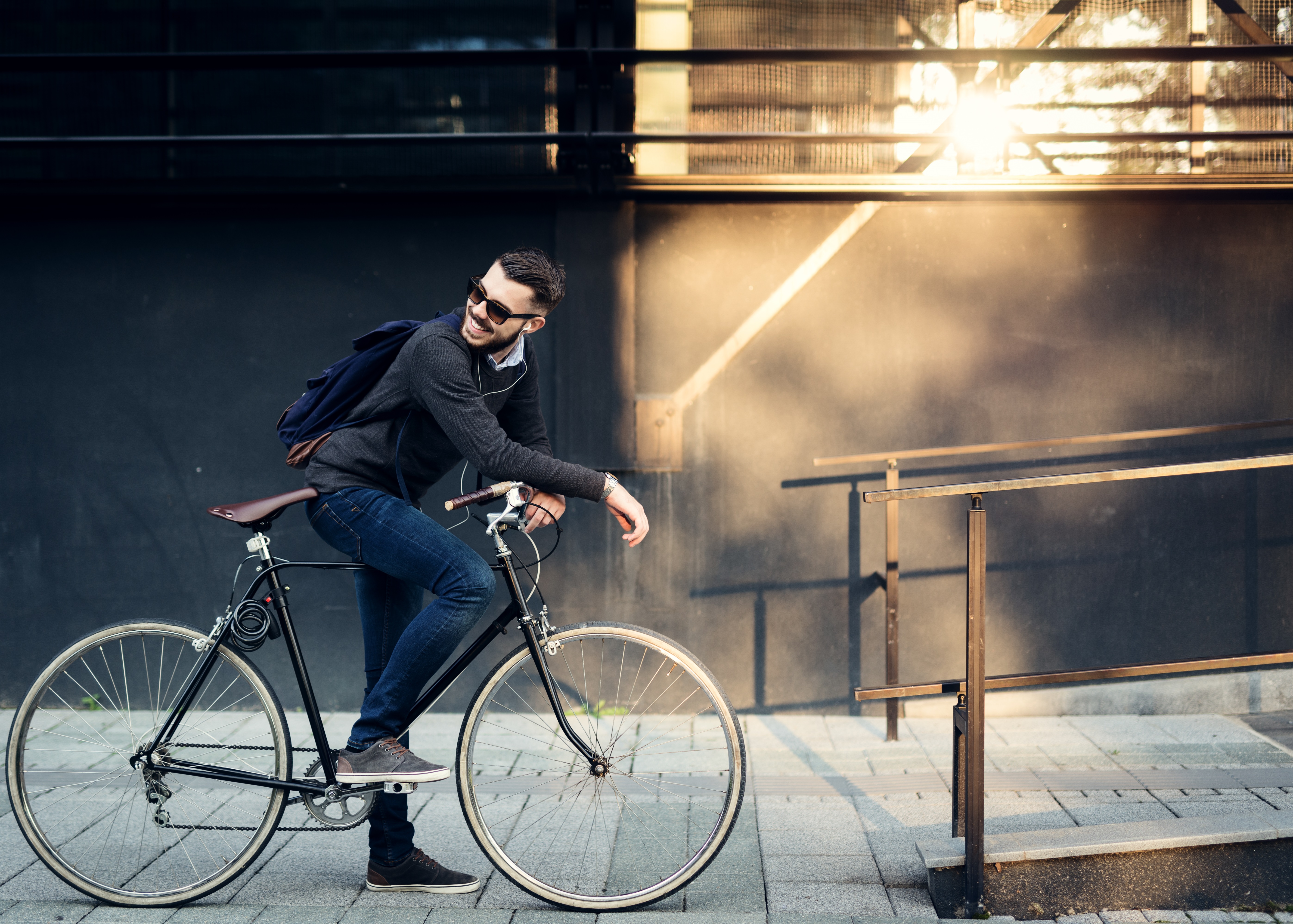 City transportation is riding a bike in the sunlight