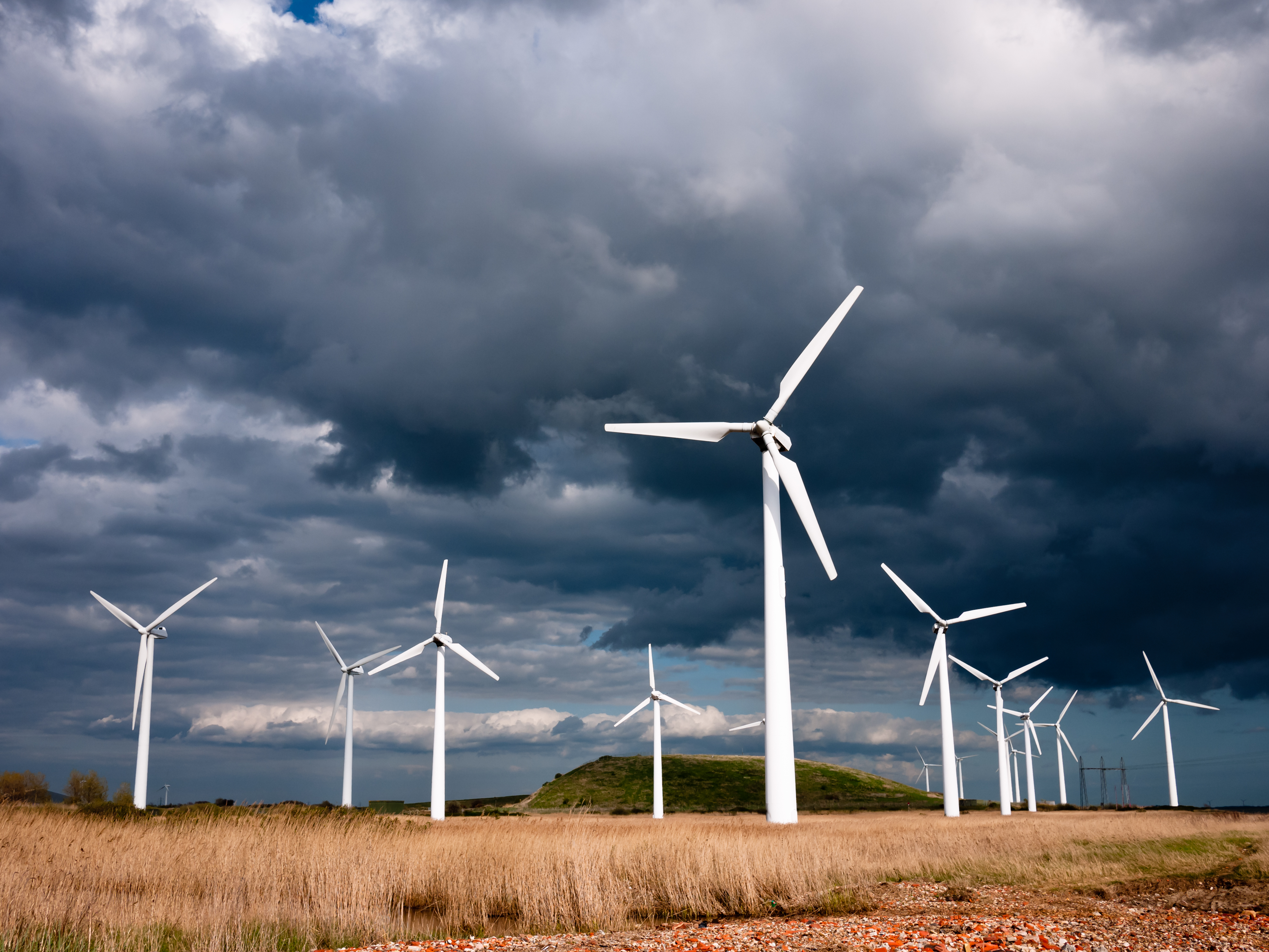 Energy - Wind mills on a cloudy day